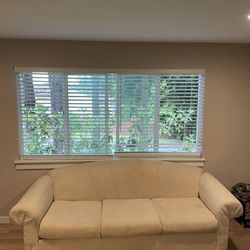3- cushioned white couch 