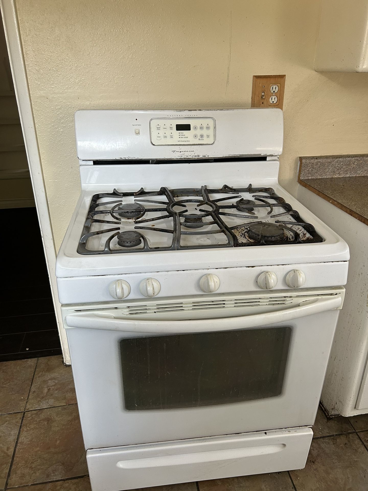 $100. (5 Burner Gas  Stove & Oven )