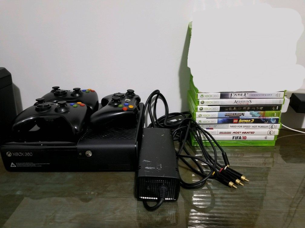 Xbox 360 (E) 500GB System - Black W/ Cable's, 3 Controllers, and 9 Games(One of them are new)