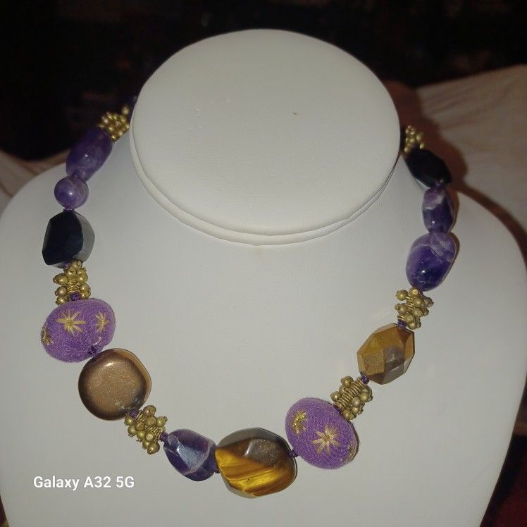 Beautiful Sigrid Olson Purple Necklace. Polished Amethyst Stone Combine With Fabric Beads And Metal On A Knotted Purple Cord. This Necklace Meas 16"i