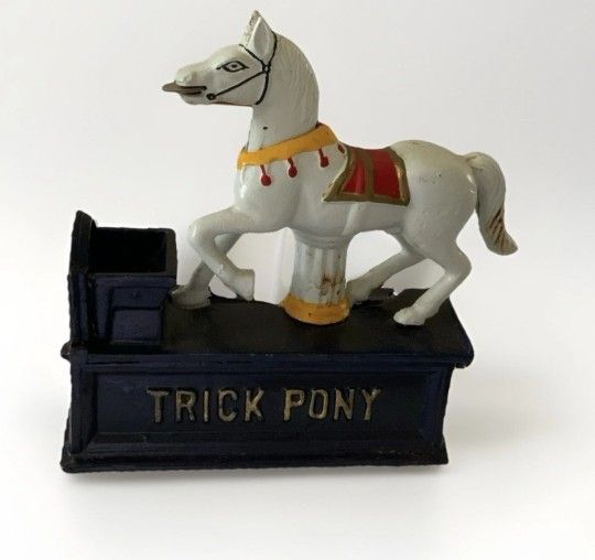 Repro Trick Pony Cast Iron Mechanical Bank Works Whimsy mechanical "Trick Pony" bank is in very good condition. place a coin in the horse's mouth, tap