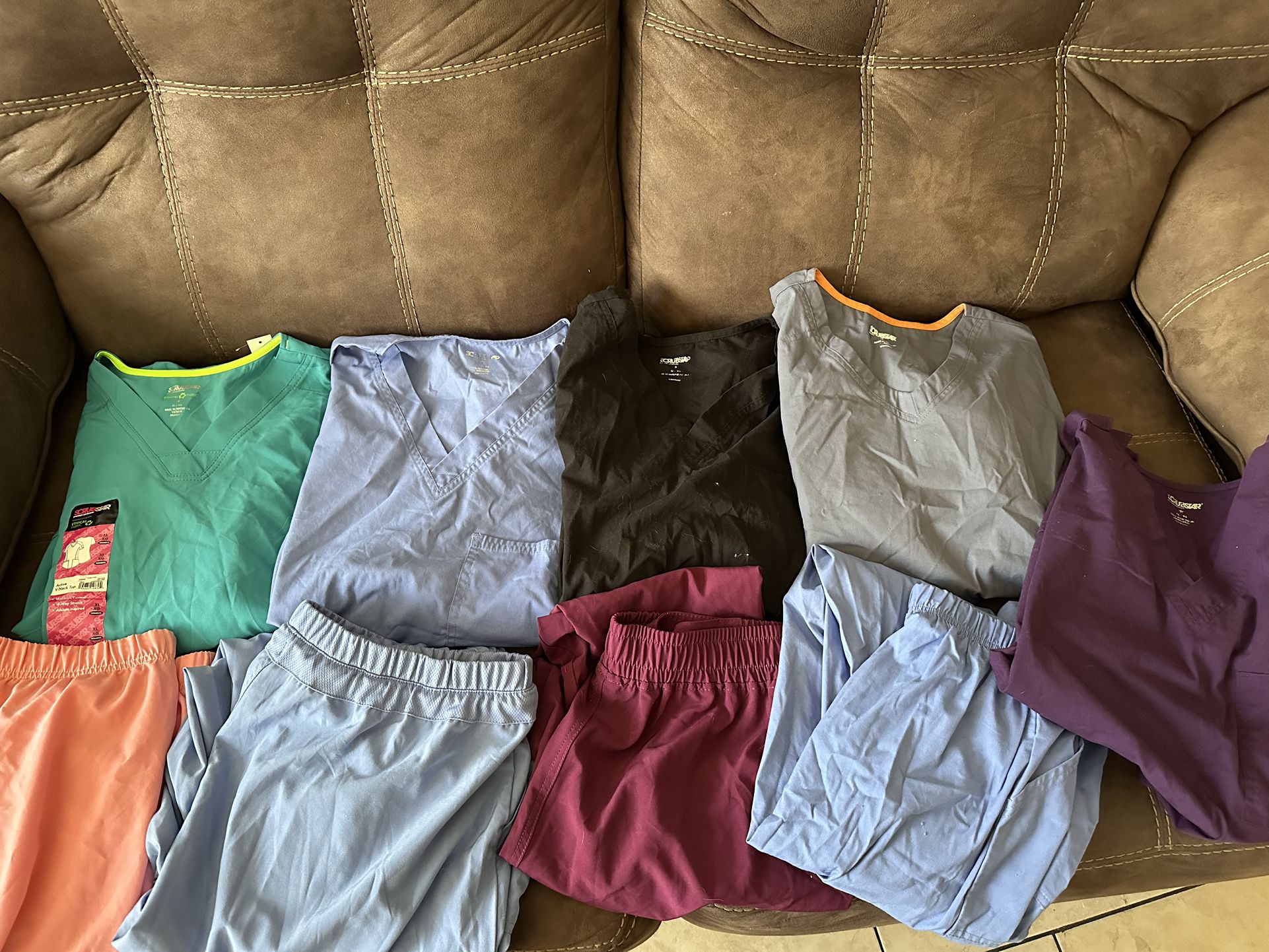 Women’s scrubs size XL. Mix of new, new without tags and used