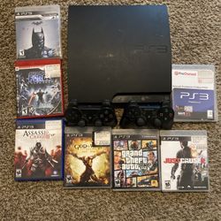 160GB PlayStation 3 With 7 Games And 3 Controllers