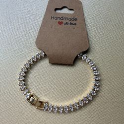 Tennis bracelet gold color with zirconias