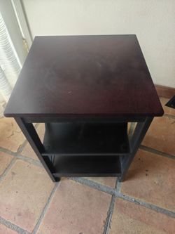 Brown wood top nightstand