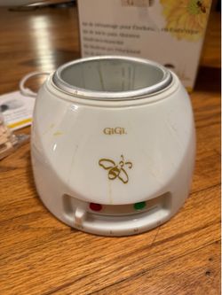 Gigi wax melter pot and wooden applicators