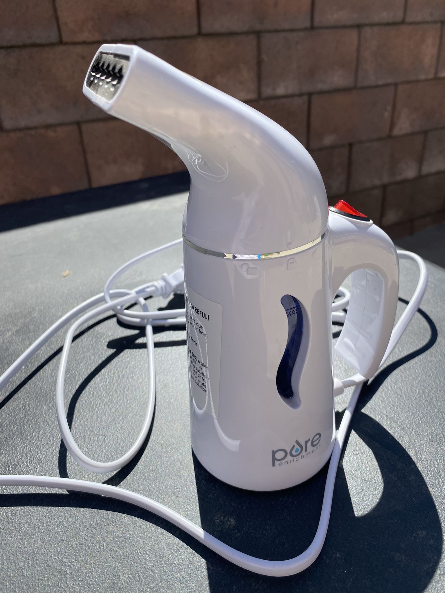 handheld steamer / pure enrichment