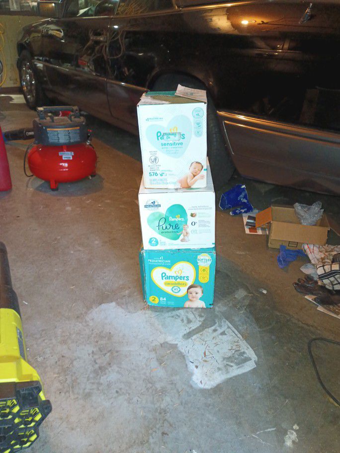 3 Boxes— Pampers Wipes And Pampers Swaddlers Size 2