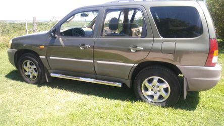 Mazda Tribute DX 2002 4 cilindros standar