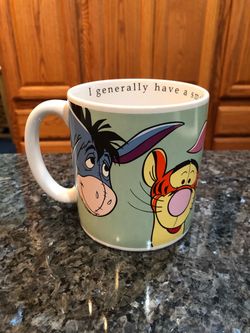 Disney Winnie The Pooh and Friends Large Coffee Cup Mug.  Inside of the cup it says “I generally have a small something about now”.  Size   4 1/2 inch
