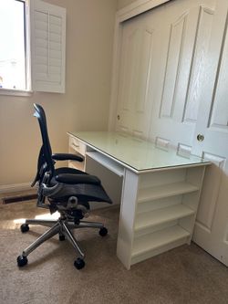 White glass top desk with shelves
