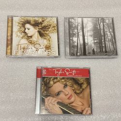 TAYLOR SWIFT CDs Fearless + Xmas Holiday Collection + Folklore, 3ea used