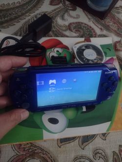Sony PSP blue 2001 1 game price is firm $130