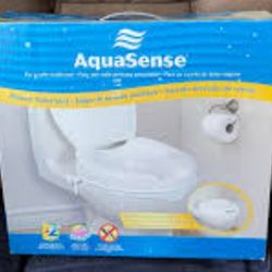BRAND New NEVER USED 4 Inch Raised Toilet Seat