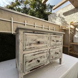 Distressed farmhouse accent dresser