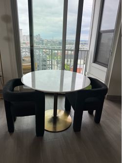 Cb2 round dining table & dining chairs