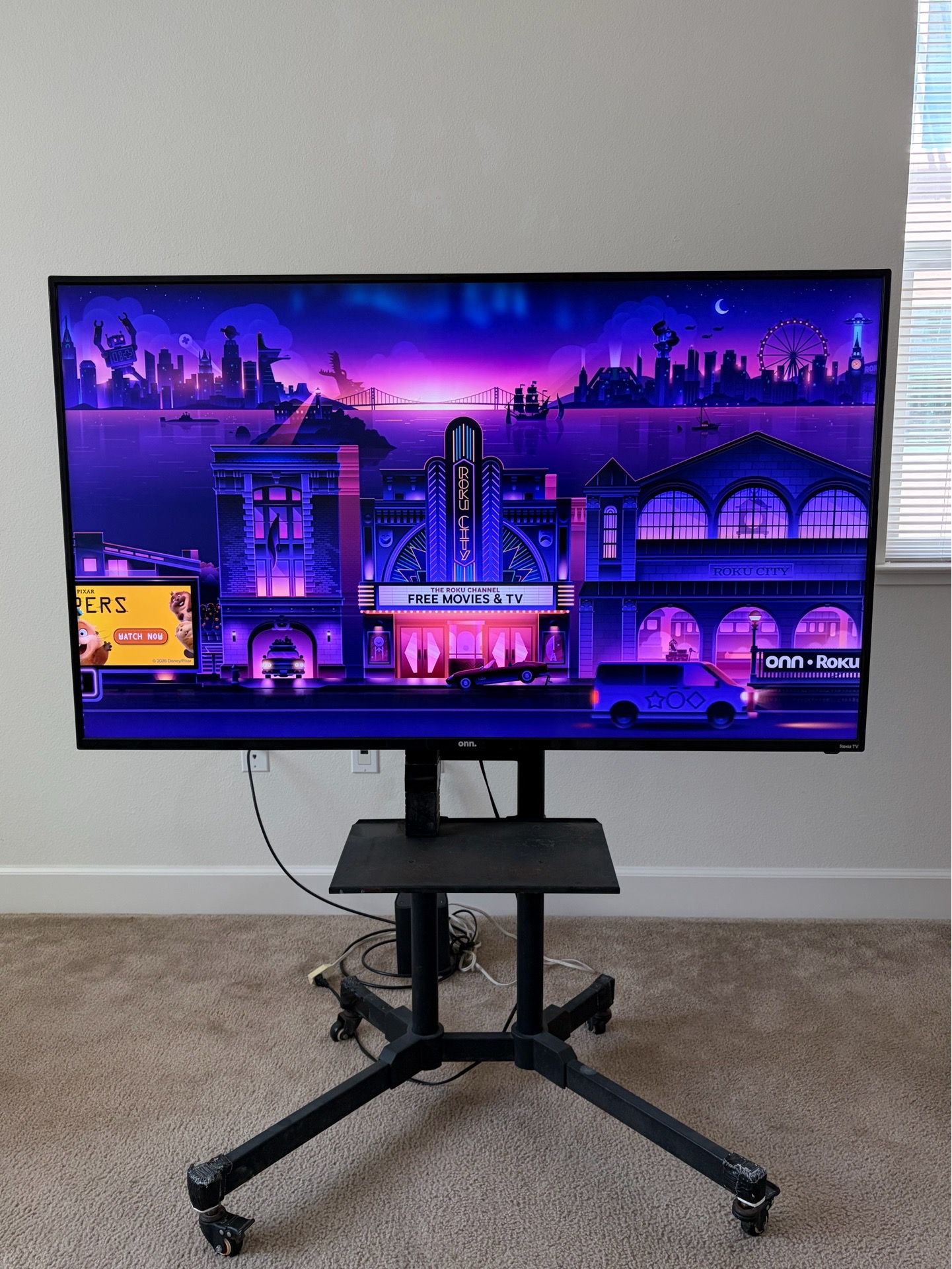 58-Inch onn. Roku TV WITH Mobile Rolling Stand - Great Condition