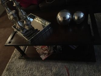 Three coffee tables one large and two small