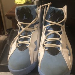 Blue and white Jordan 7s size 9 men’s
