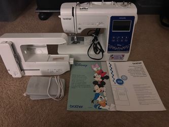 Disney Versatile Brother Innov-is NS1750D sewing and embroidery machine in white.