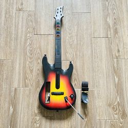 Nintendo Wii Guitar Hero Wireless Sunburst Guitar Controller RedOctane 95455.805. With shoulder strap and fully tested. Great condition and well maint