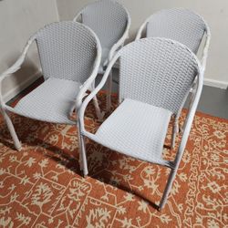 Brand New Stackable White Wicker Patio Chair Set (4)