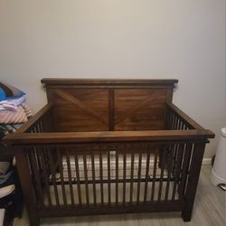 Assembled and Unused Baby Crib