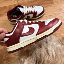Women’s Dunk Lows in Vintage Red