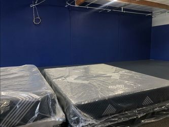 New Queen Mattress Still in Plastic Wrap