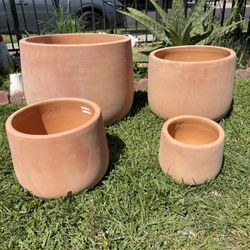 Tuscan Terracotta Pear Bottom Planters($125 set of 4 )