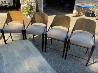 Four wood backed chairs