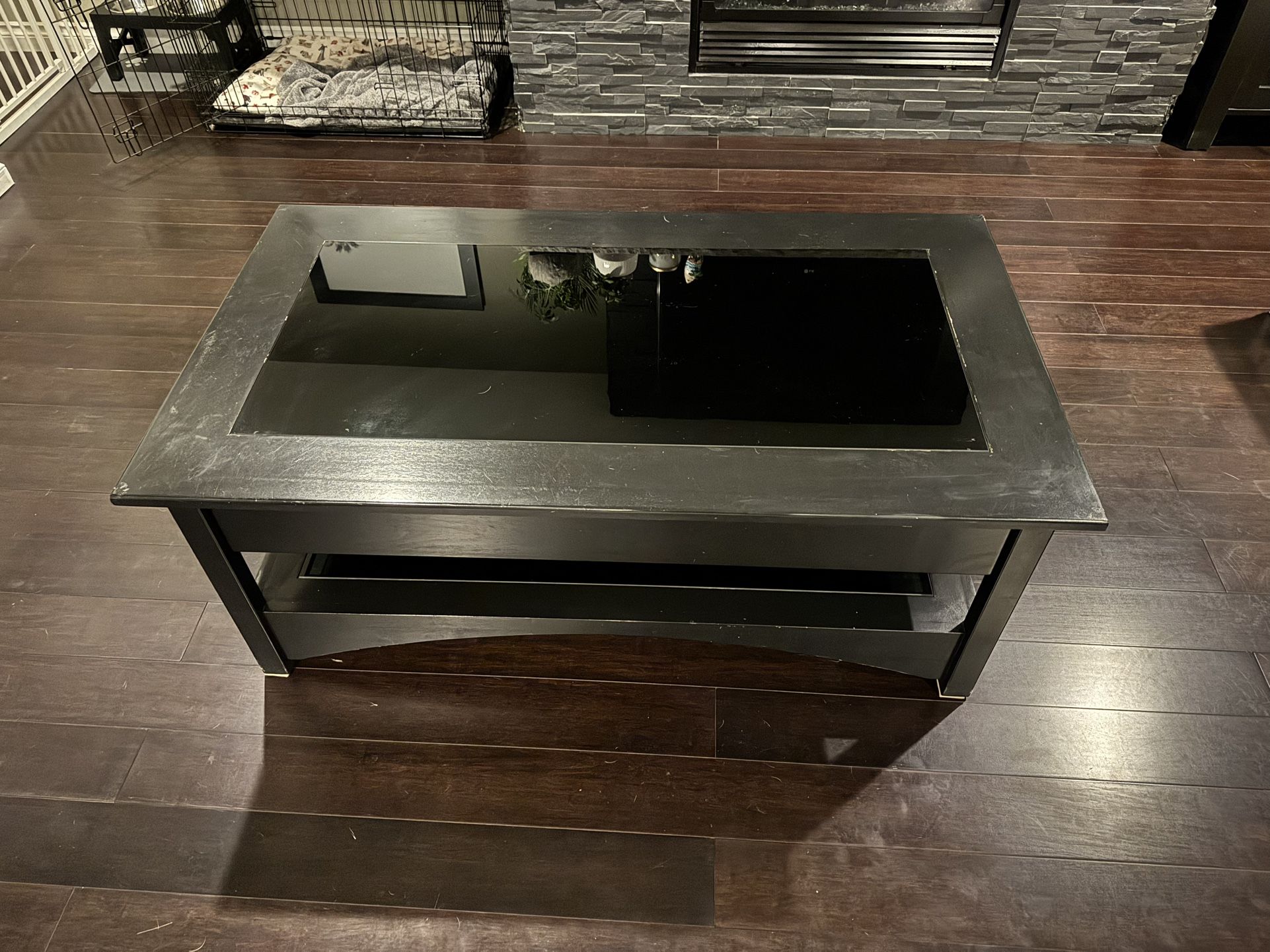Black Coffee Table with Glass Top 28in X 49 3/4in