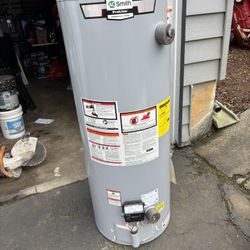 50 Gallon Direct Vent Gas Hot Water Tank, Dented On Outer  Metal Skin