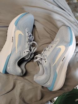 Brand new Nike wind flow for women