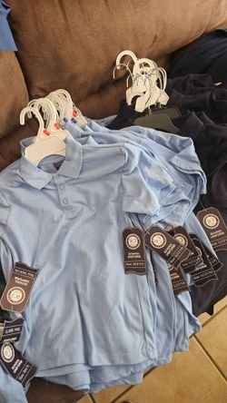 Uniforms , shirts, white, baby blue,  navi  blue, green. Burgundy red, pants khaki, navi  blue.