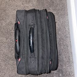 “Compact Black Fabric Suitcase with Multiple Compartments”