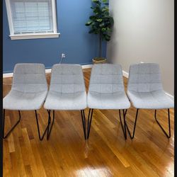 Four Gray chairs