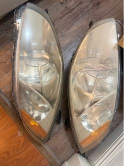2009-2012 Mitsubishi Eclipse OEM Headlights Pair (Spyder / Coupe)
