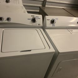 Kenmore a top load washer and dryer