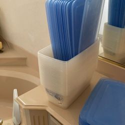 24 plastic containers you could put shoes in there you could put little objects