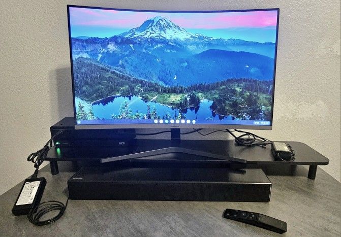 SAMSUNG 32" Curved Full HD (1,920 x 1,080) Monitor and Samsung TV Mate Soundbar