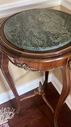Tall corner table with green set above