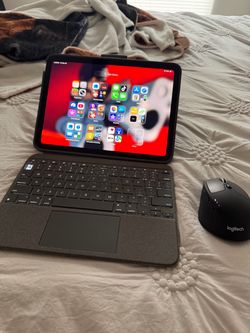 Apple iPad with Keyboard Case and Logitech Mouse