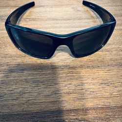 Oakley Fuel Cell Sunglasses - Polished Black / Warm Grey** **Product Overview** The Oakley Fuel Cell is an iconic blend of art and technology, desig