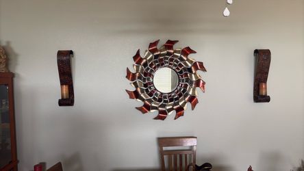 Wall mirror with candle holders on each side