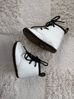 Dr. Martens white crib boots