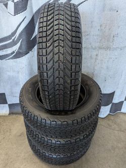 235/65r17 "Nubby New" Firestone Winter Force UV studded winter snow tires