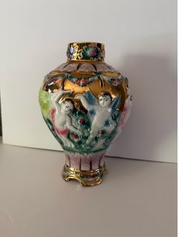 Vintage cherub vase
