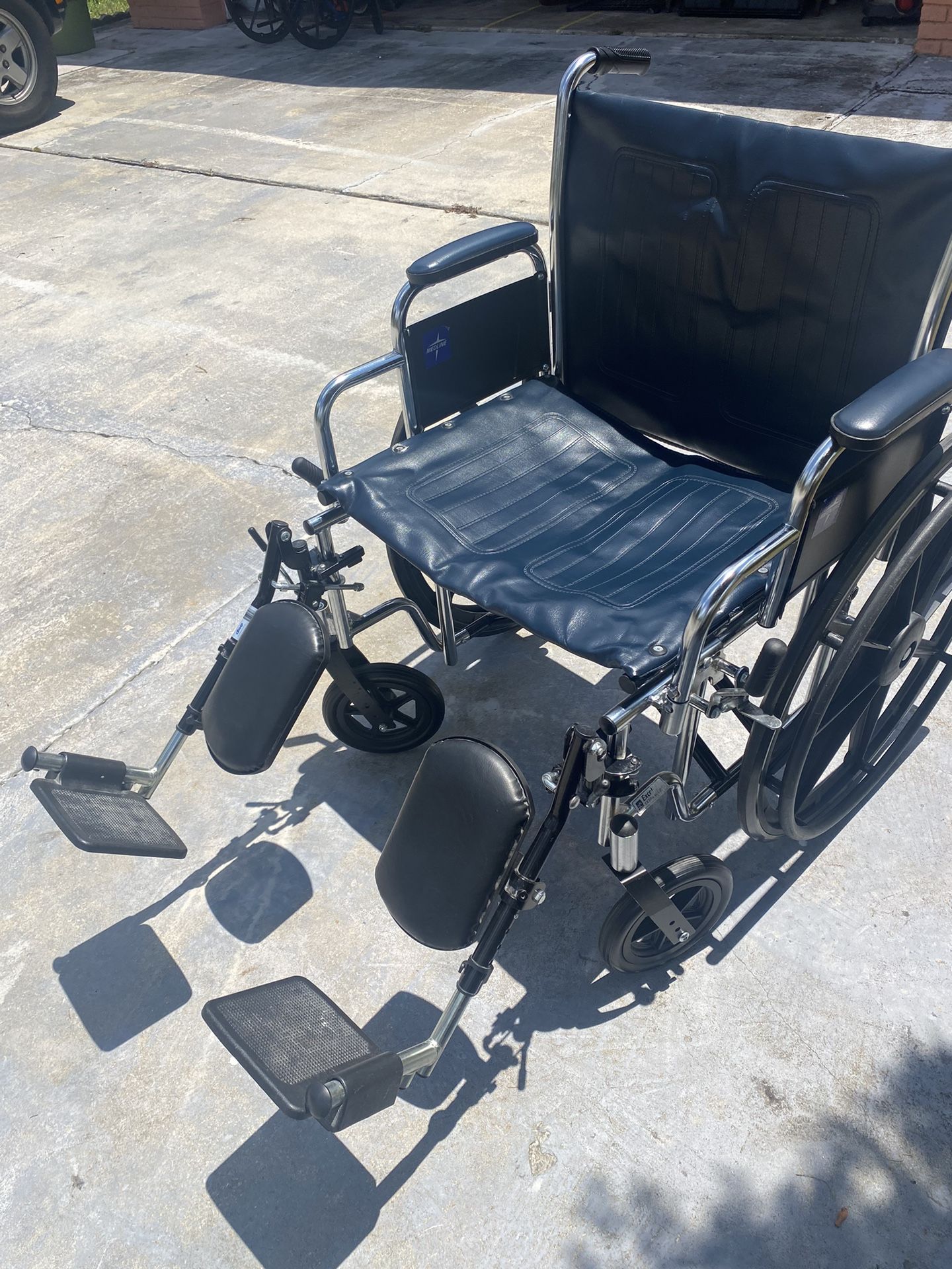 Wheelchair With Elevated Footrest