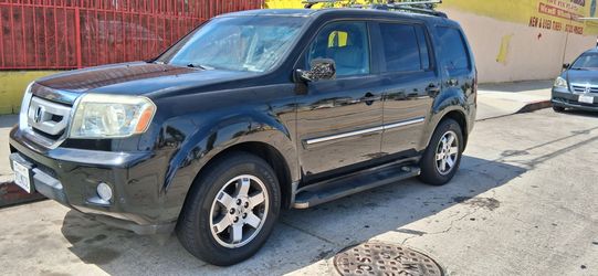 2009 HONDA PILOT TOURING.TITULO LIMPIO
